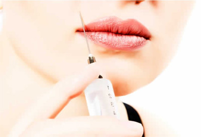 labios mujer con jeringuilla relleno